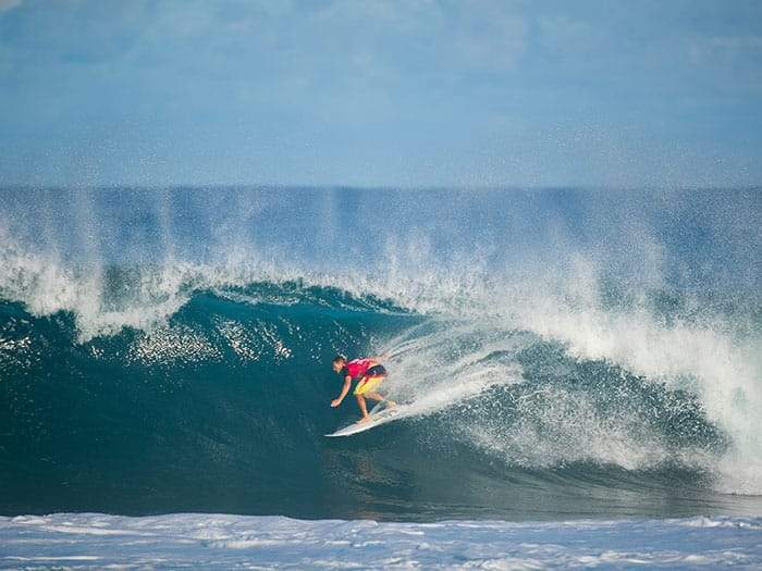 surfer in a right barrel